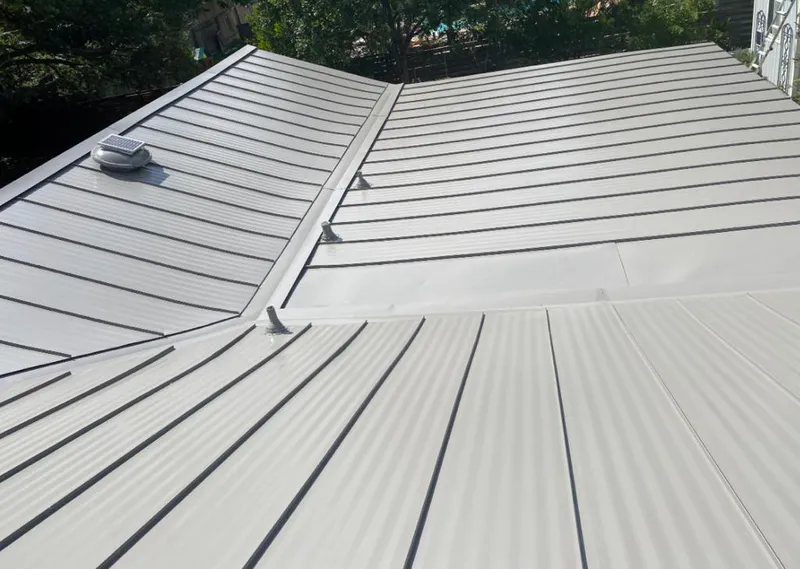 Solar attic fan installed on a metal roof for Roof Ventilation in Rancho Cordova
